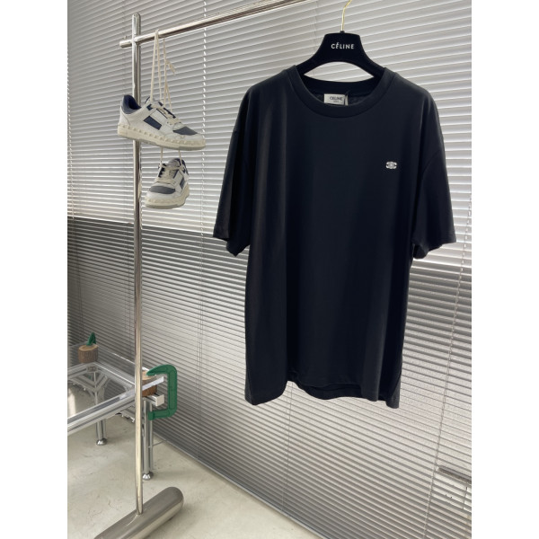 트리옴프 자수 평문 니트 루즈 티셔츠